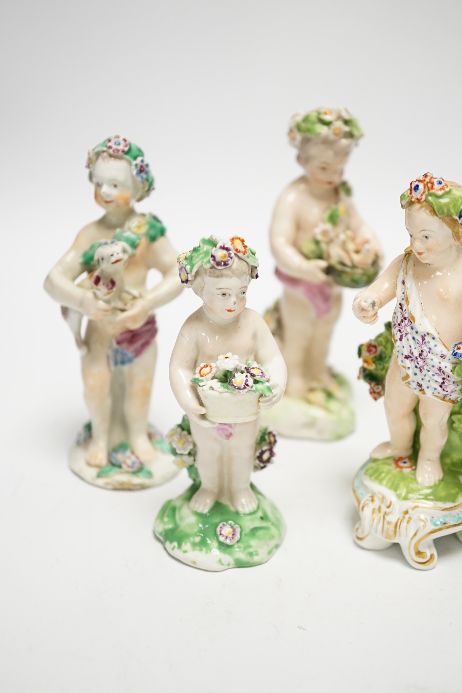 Six 18th/19th century figures by Bow and Derby, including a flower encrusted Bow figure with bocage, 15cm